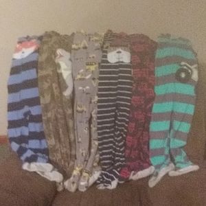 Size 3T 6 pairs of Boys one piece pajamas.